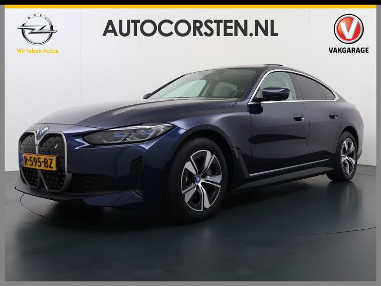 Foto van BMW i4 eDrive40 340pk High Executive 84kWh SOH 99% Pano-Dak/Hefdak SportSt+Leer+(Stuur+)Verwarmd 360°Camera Adaptive-Cruise+s&go Park-Assist-plus HUD LASER-LED Bordherk. Live-Cockpit-Pro Apple-Android Carplay Smartphone-entry