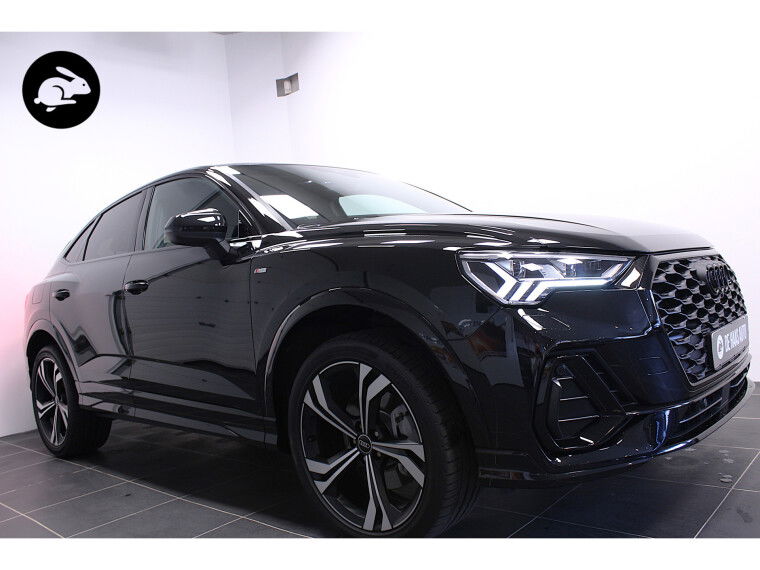 Foto van Audi Q3 Sportback 45 TFSI e S-Line/Black ed./20 inch/Rood sticksel/360* camera