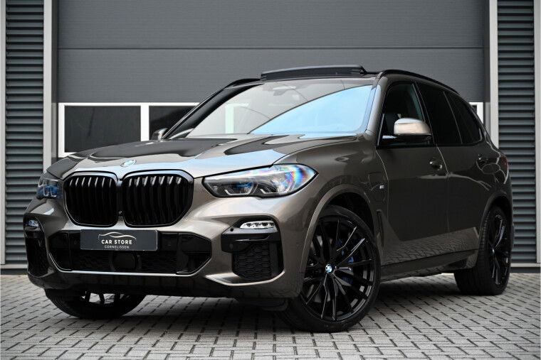 Foto van BMW X5 xDrive45e M-SPORT / PANO / INDIVIDUAL LEDER / MASSAGE / LASER / HUD / SOFTCLOSE / 4WIELSTURING / MANHATTEN GREEN