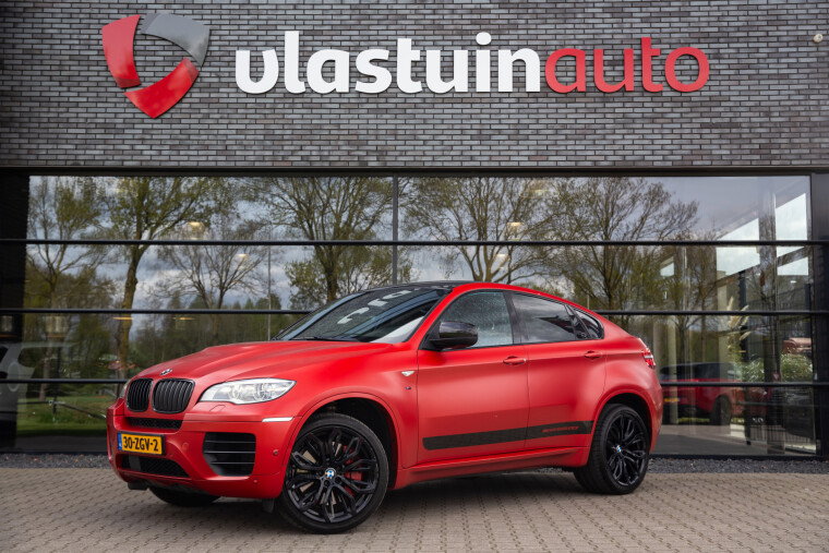 Foto van BMW X6 M50d