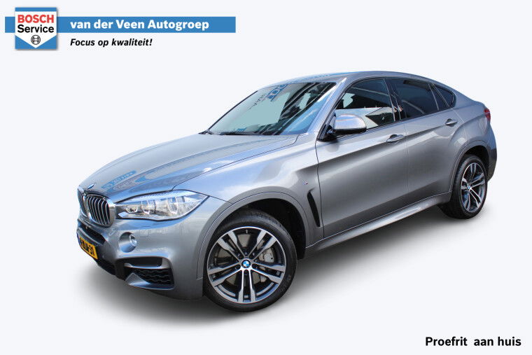 Foto van BMW X6 M50d