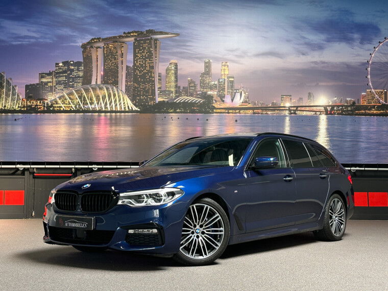 Foto van BMW 5 Serie Touring 530i High Executive