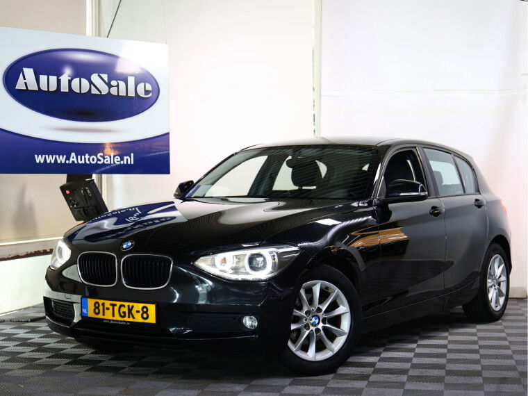 Foto van BMW 1-serie 116i NAP XENON NAVI BLUET PDC CRUISE TREKHAAK CLIMA '12
