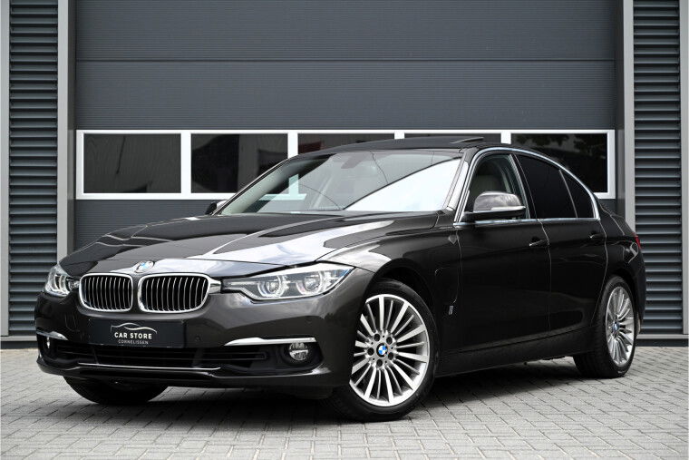 Foto van BMW 3-serie 330e HIGH EXECUTIVE / SCHUIFDAK / LEDER / STOELVERWARMING / LED / SPORTSTUUR / CRUISE CONTROL