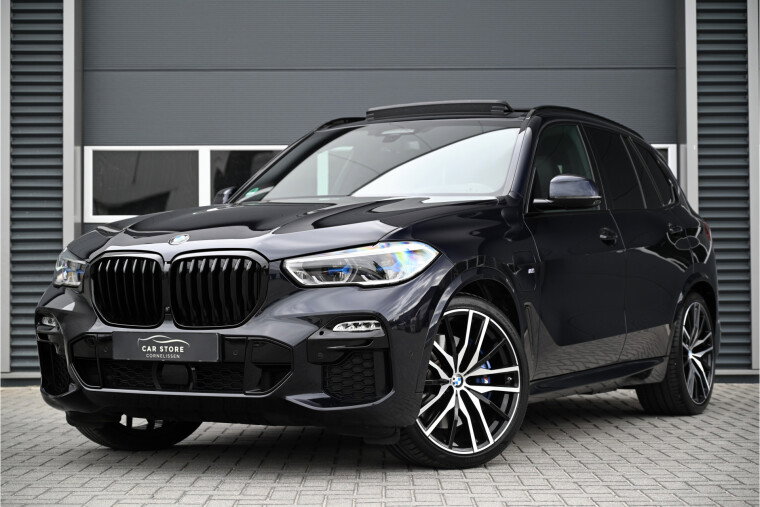 Foto van BMW X5 xDrive40i M-SPORT / PANO / BOWERS & WILKINS / LASER / SOFTCLOSE / HUD / COMFORTSTOELEN / TREKHAAK / 22"