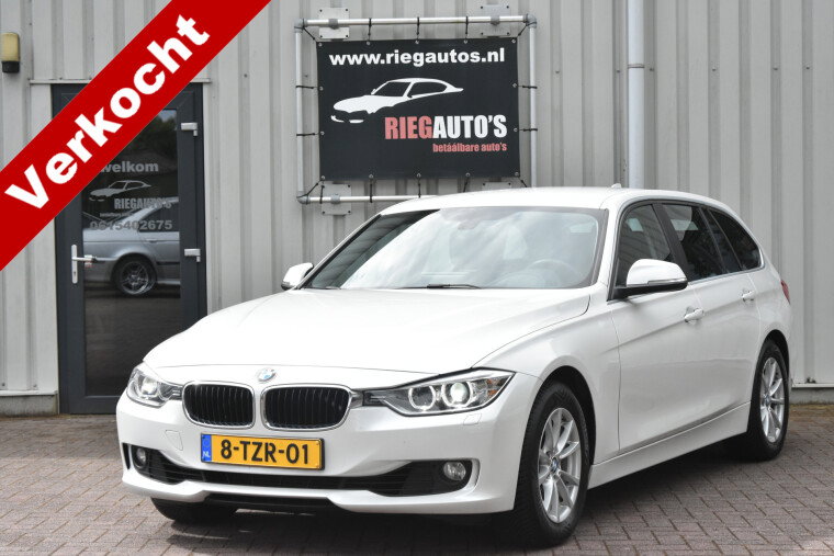 Foto van BMW 3 Serie Touring 320i Executive Touring – 2014 | Nederlandse auto | Trekhaak | Mooie uitvoering