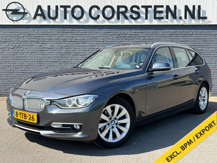Foto van BMW 3 Serie Touring 136PK Automaat Leder+Verwarmd Sportstoelen Navi Ecc Cruise Control Pdc Xenon Executive