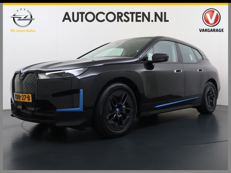 Foto van BMW iX xDrive40 327PK Executive SOH 99% Trekhaak 4-Zone Ecc Head-Up Display Camera Apple Carplay Stoelverwarming