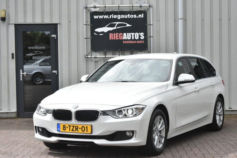 Foto van BMW 3 Serie Touring 320i Executive Touring – 2014 | Nederlandse auto | Trekhaak | Mooie uitvoering