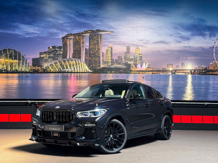 Foto van BMW X6 M50i High Executive