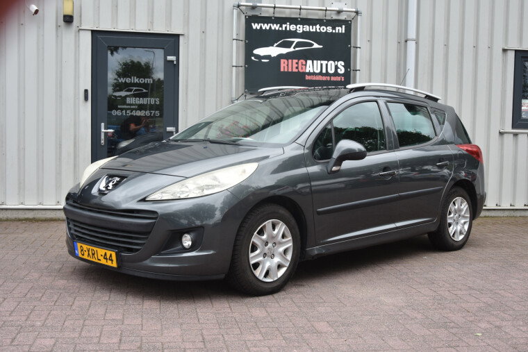 Foto van Peugeot 207 SW 1.4 VTi XS. Koude Airco, Panorama dak, trekhaak!!